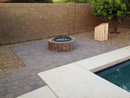 Pavers, fire pit and outhouse