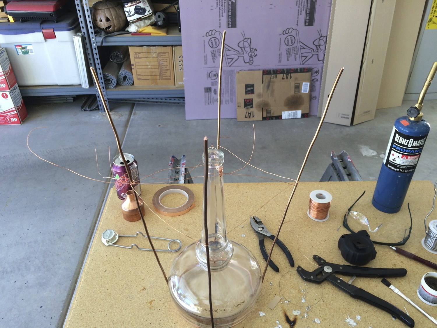 Willet Bottle as the Center of the Bourbon Bottle Chandelier