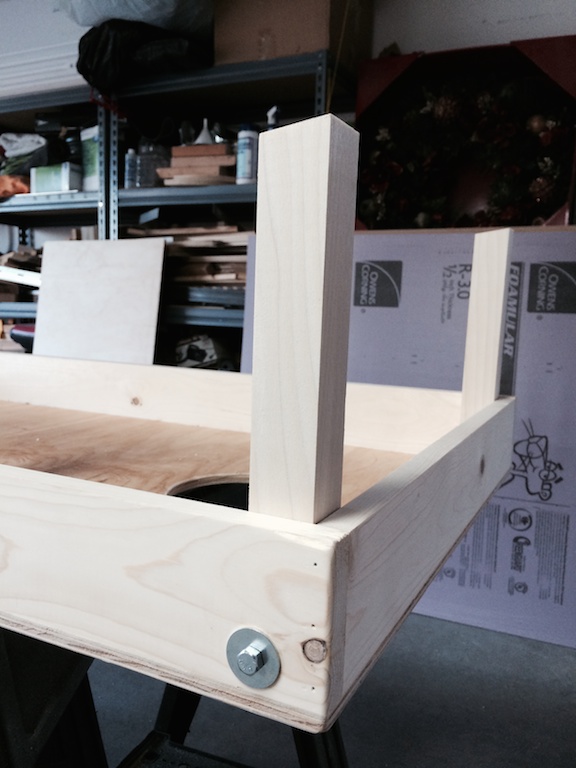 Cornhole board leg installed