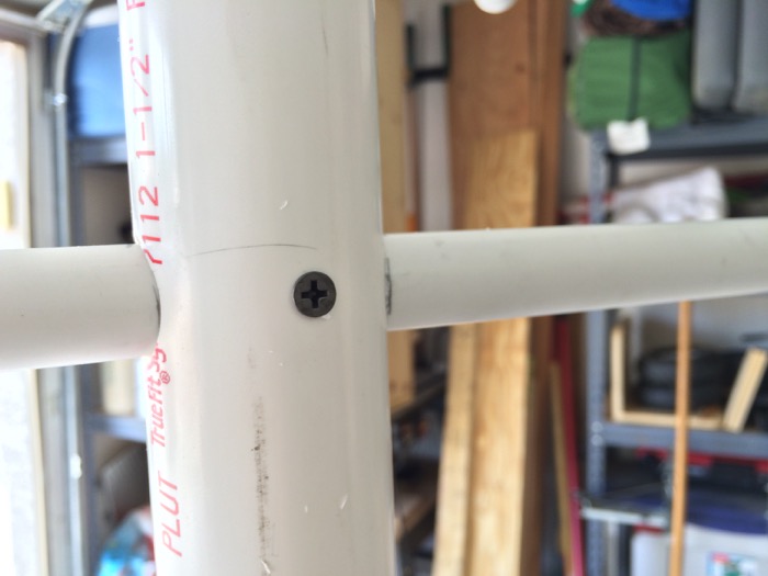PVC arm screwed in place through PVC stem