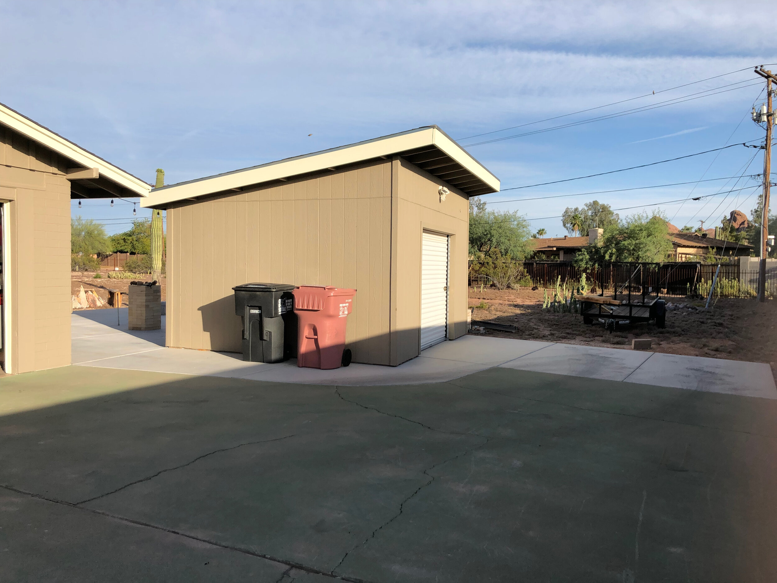 The completed shed, including matching paint job with the recent house painting
